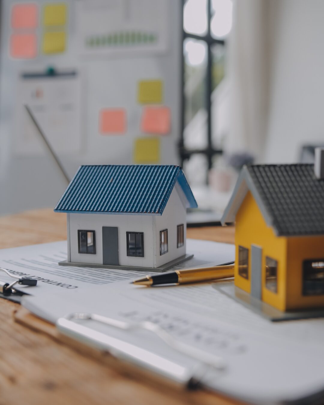 House models and documents used for property planning