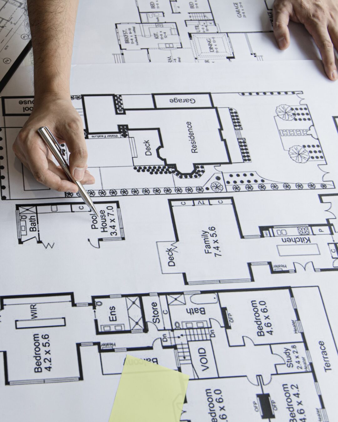 Draughtsman reviewing architectural plans