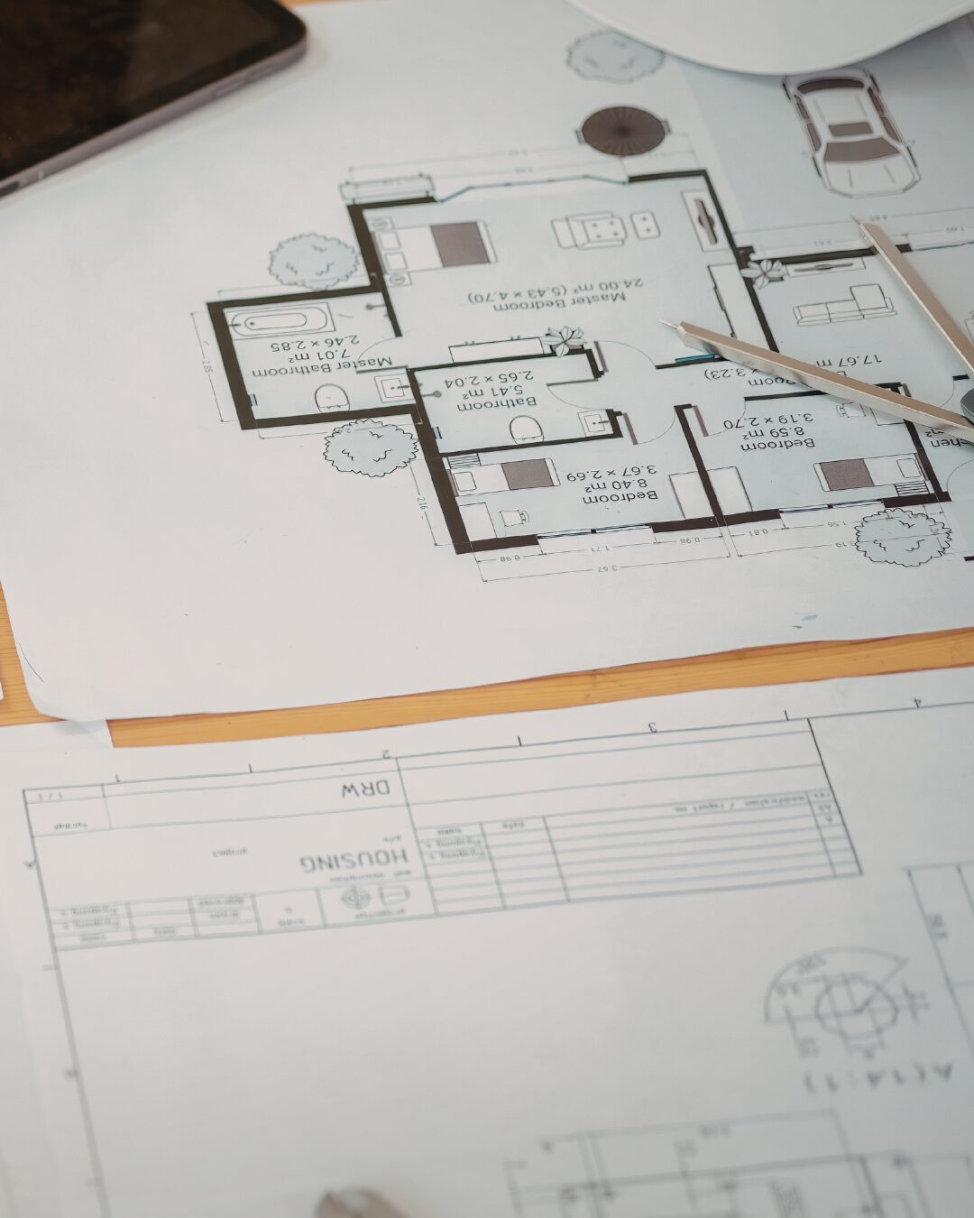 Architects reviewing building plans for approval